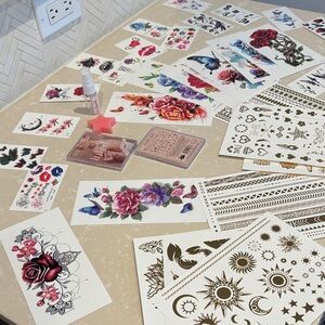 Temporary Tatoos— over 100 designs.